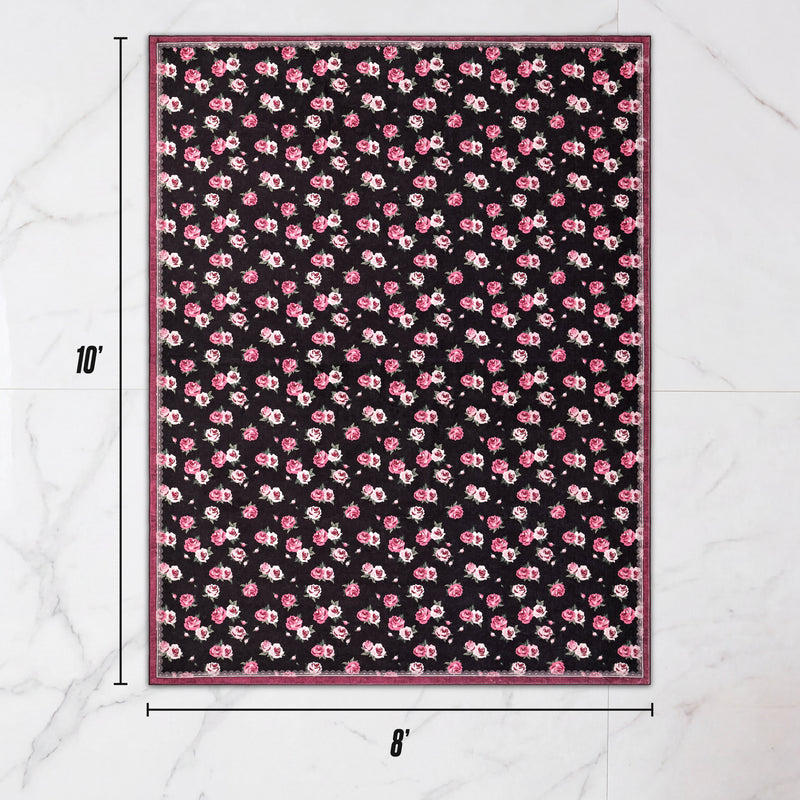 Ultra-soft, rectangular Finley Washable Rug, 8′ x 10′, featuring a dark floral pattern of pink and white roses.