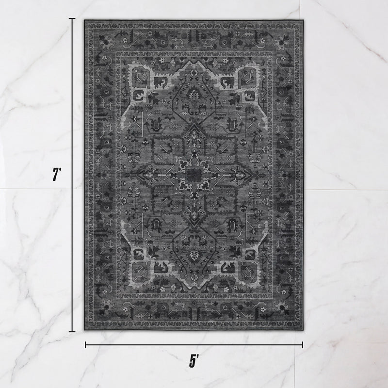 Finley Washable Rug, 5′ x 7′, featuring a rectangular, ultra-soft, gray, traditional Persian-style pattern, shown against a white marble floor with dimension markers.