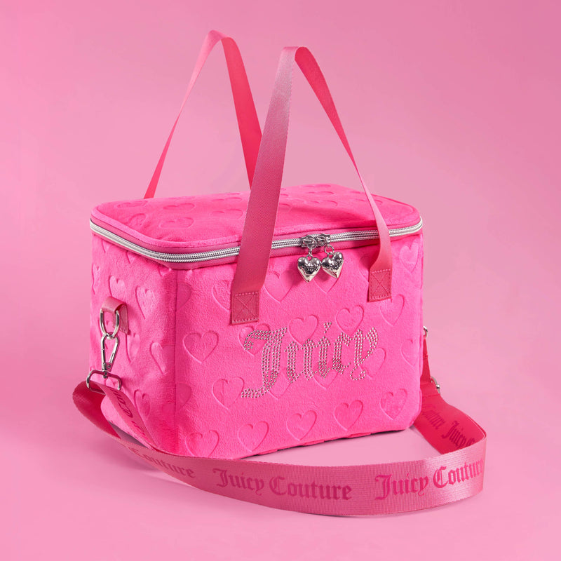 A bright pink Chill Couture Cooler Bag with heart patterns, a silver zipper, two heart-shaped charms, and “Juicy” written in rhinestones. This stylish cooler bag features pink carrying straps and a detachable logo shoulder strap, making it as practical as it is eye-catching.