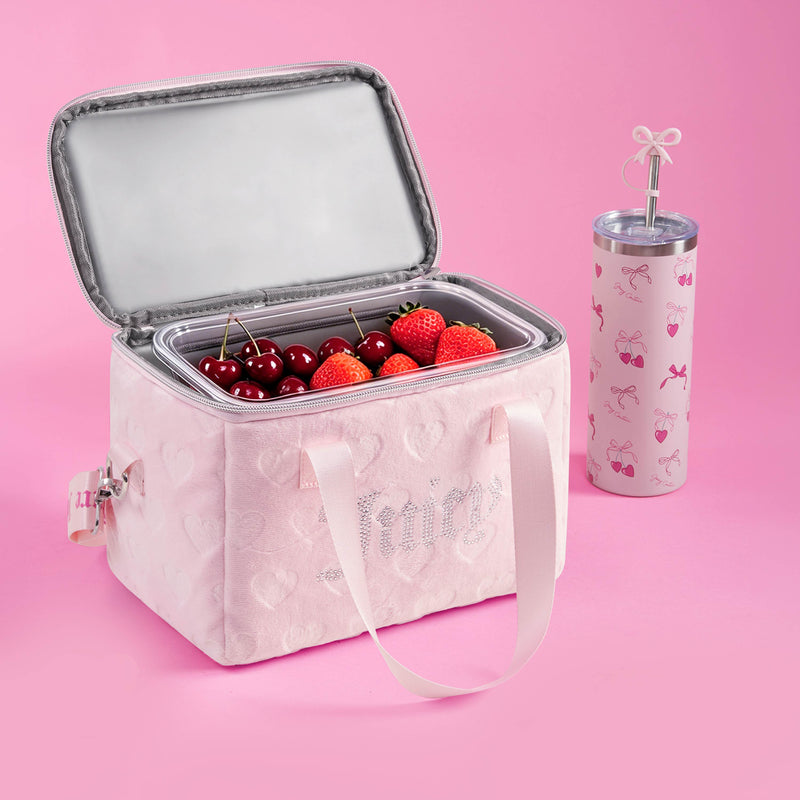 A Chill Couture Cooler Bag filled with strawberries and cherries sits next to a pink drink tumbler adorned with cute patterns, all set against a pink background.