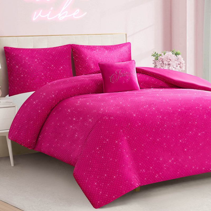 A bed featuring the Velvet Rhinestone Princess Comforter Set—with its bright pink, star-patterned bedding and coordinating pillows, including a decorative “Sweet” pillow—serves as the focal point of the room. The plush velour comforter adds an extra touch of luxury and coziness. A vase with pink flowers rests on the nightstand, while a neon sign casts a glow on the wall.