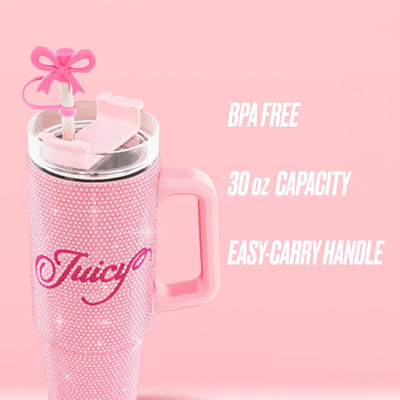 The BlingSip Rhinestone Tumbler with Handle Straw and Topper features a pink rhinestone design, “Juicy” in cursive lettering, a large pink handle for easy carrying, a pink bow on the straw, and holds up to 30 oz. With BPA-free insulated stainless steel construction, this stylish tumbler is perfect for keeping your drinks at the ideal temperature all day long.