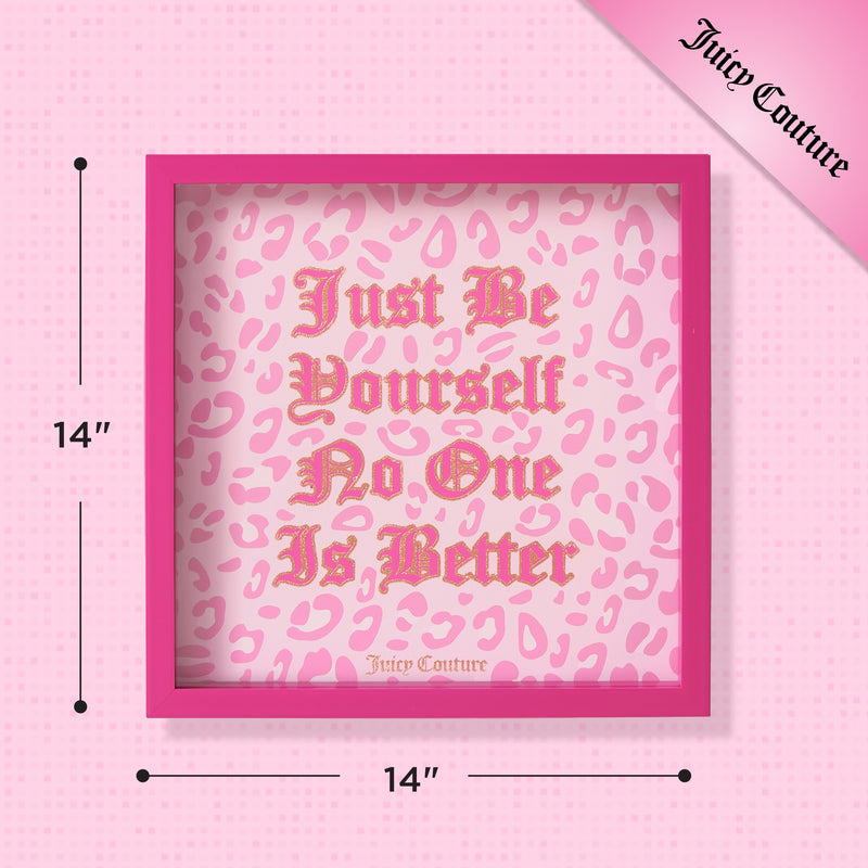 Add a touch of style to your space with the Juicy Couture Shadow Box Wall Art, 14″ x 14″. This piece features a pink square frame with gold text that reads “Just Be Yourself No One Is Better” against a vibrant pink leopard print background. Finished with the iconic Juicy Couture logo in the corner, this bold artwork brings fashion-inspired flair to any room.