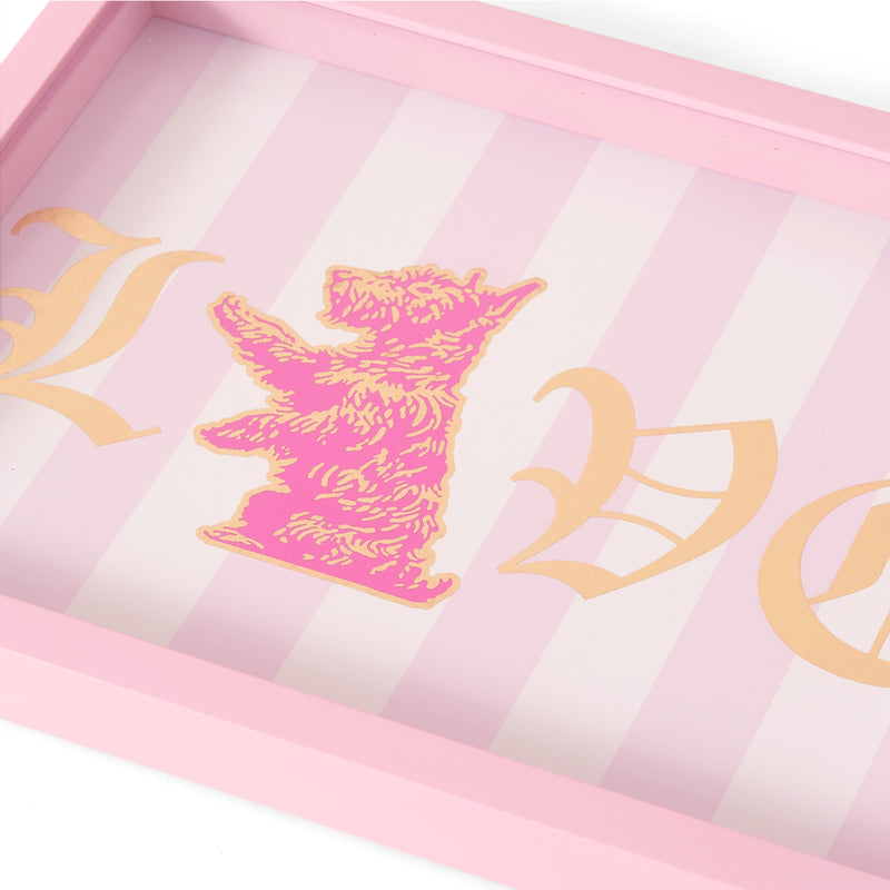 The Shadow Box Wall Art (12″ x 16″) features a pink tray design with light pink and white stripes, accented by a gold outlined bear illustration in the center and large gold Gothic-style letters on either side—an eye-catching piece reminiscent of Juicy Couture wall art, perfect for any fashion-inspired artwork collection.