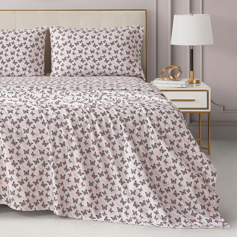 Printed Microfiber Sheet Set featuring a repeating pattern of pink and black butterflies on a white background.