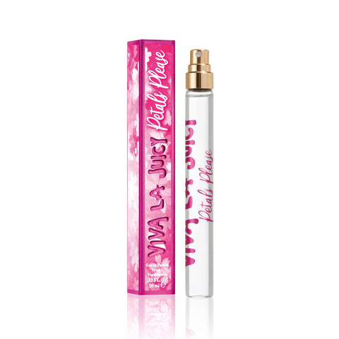 A clear Viva La Juicy Petals Please Eau de Parfum Travel Spray stands beside a matching pink floral box, both reflecting the floral fruity scent with notes of Vanilla Madagascar in their design and branding.
