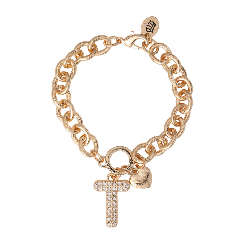 The Pavé Initial Charm Bracelet, Letter T, features a bold gold chunky chain adorned with a rhinestone-studded letter T charm and a dainty heart charm near the clasp—perfect for those who love statement charm jewelry.
