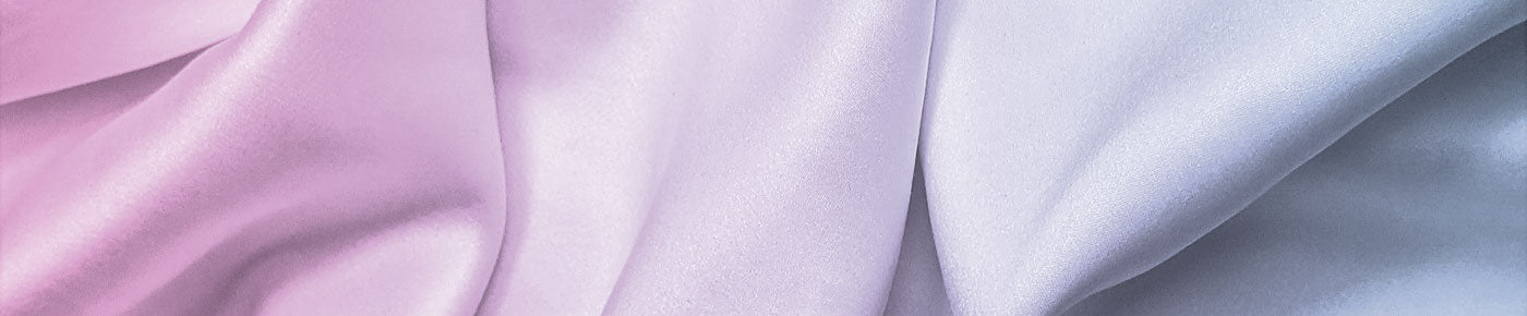 Close-up of gradient purple and blue fabric with soft folds