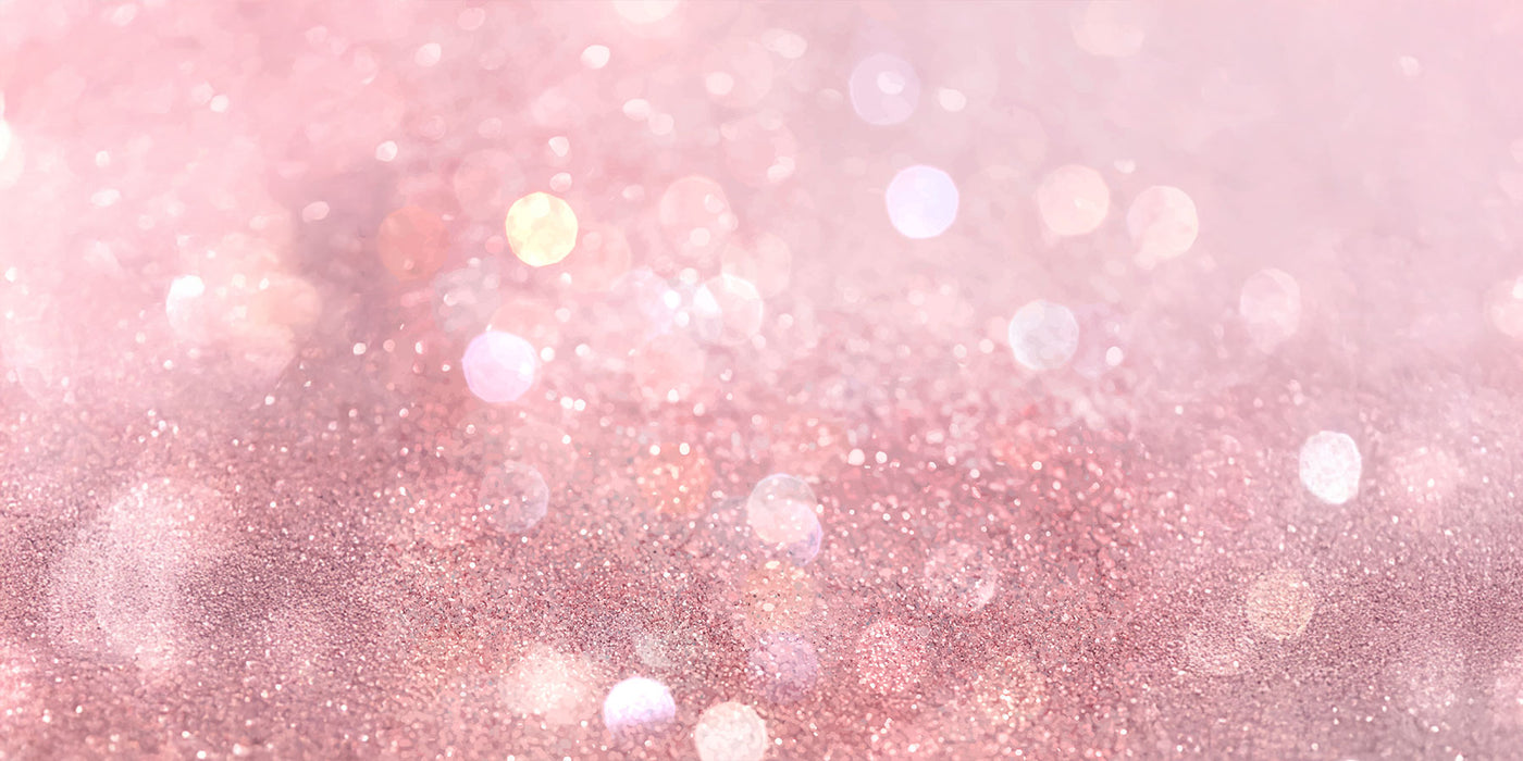 Pink glittery background with bokeh lights