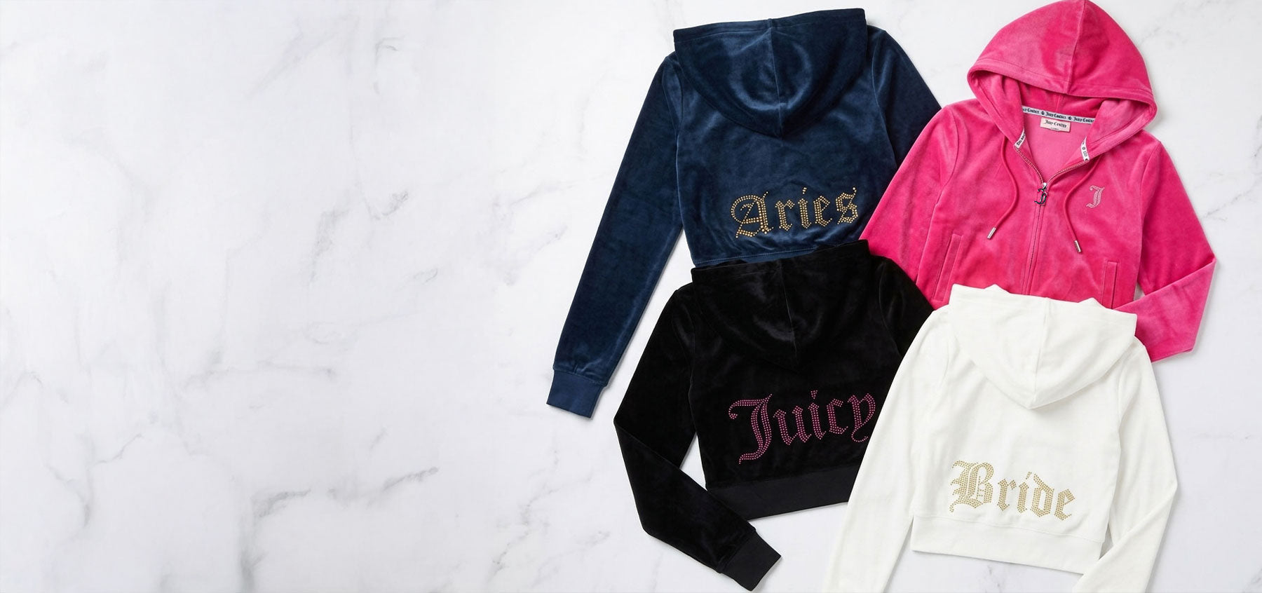 Three tracksuit tops with 'Aries', 'Juicy', and 'Bride' text and a pink tracksuit top with a 'J' initial on the front on a white background