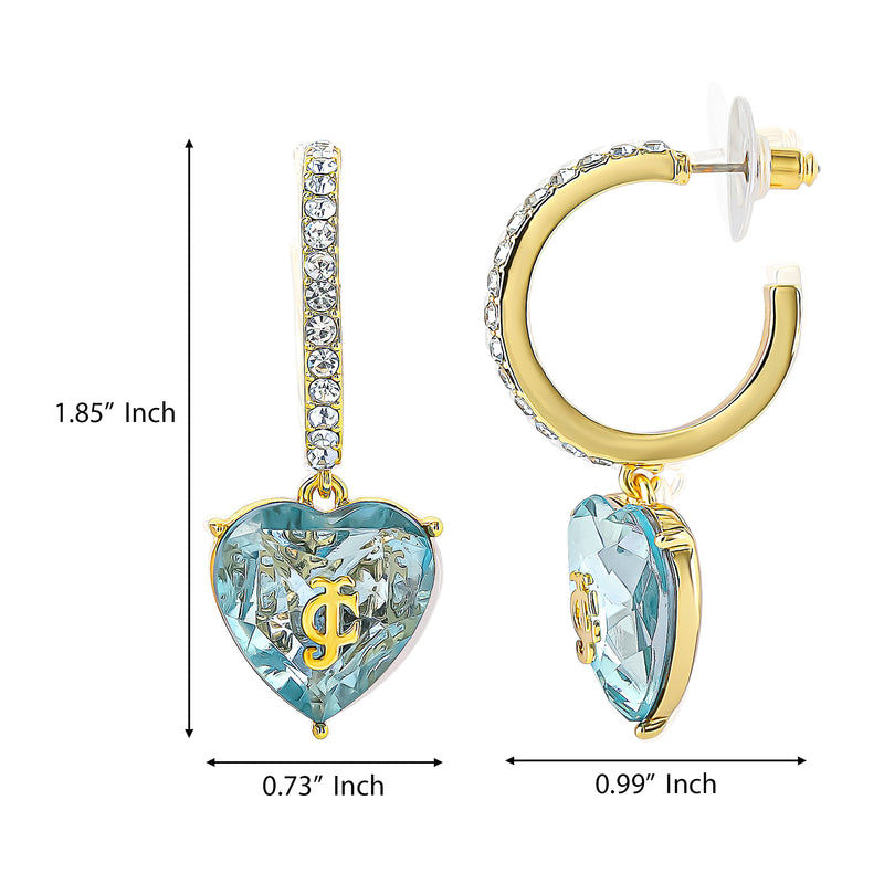 The Heart Charm Hoop Earrings by Juicy Couture feature gold statement hoops adorned with blue heart-shaped crystals, sparkling clear stones along the hoops, and a signature gold JC logo at the center. Measuring 1.85″ in height, 0.73″ in width, and 0.99″ in side depth, these earrings are perfect for adding a bold touch to your heart jewelry collection.