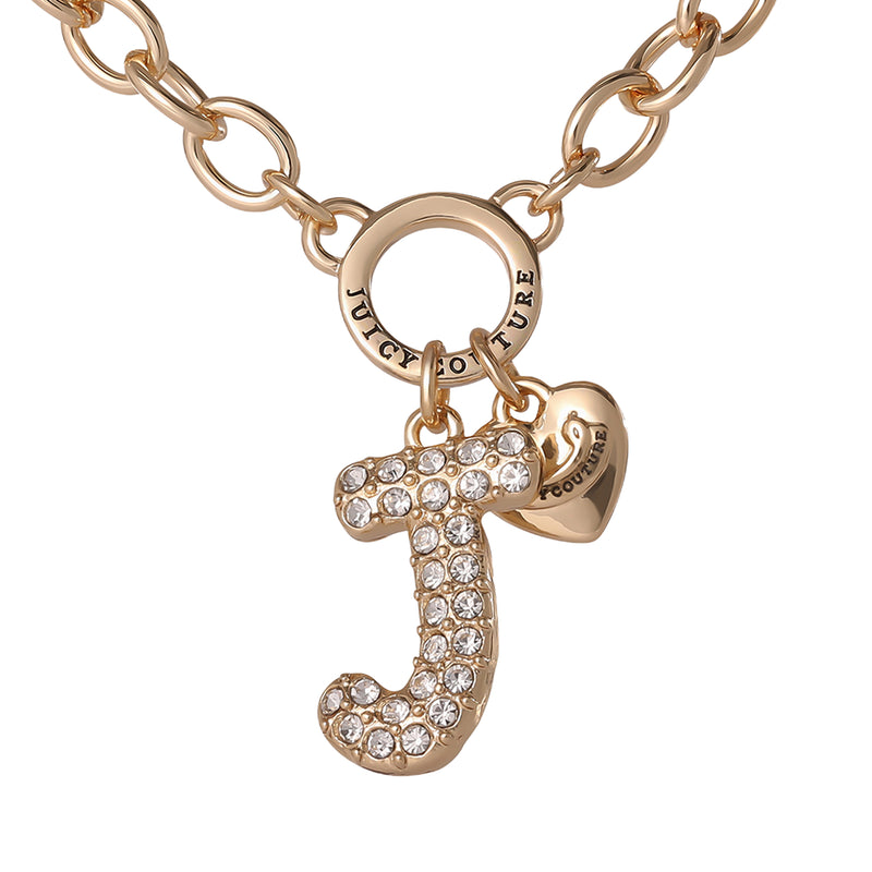 The Bubble Initial Necklace, Letter J, features a gold chain with a crystal-studded bubble letter “J” pendant and a dainty gold heart charm engraved with Juicy Couture—making it the perfect accessory for fans of Y2K jewelry and personalized necklaces.