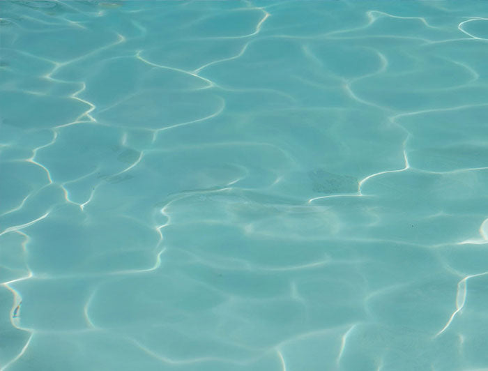 Close-up of clear blue water with ripples